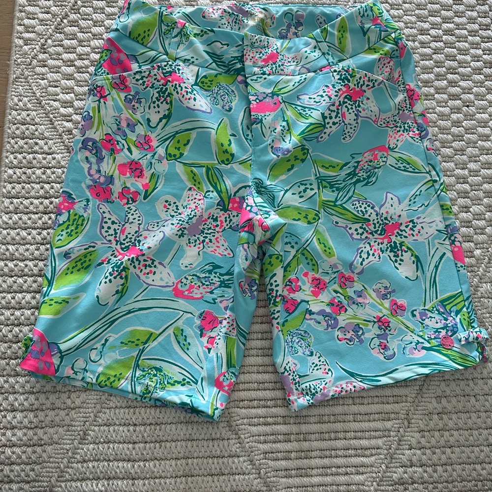 Lilly Pulitzer Luxletic Fairway shorts with a blue, pink, and green floral print